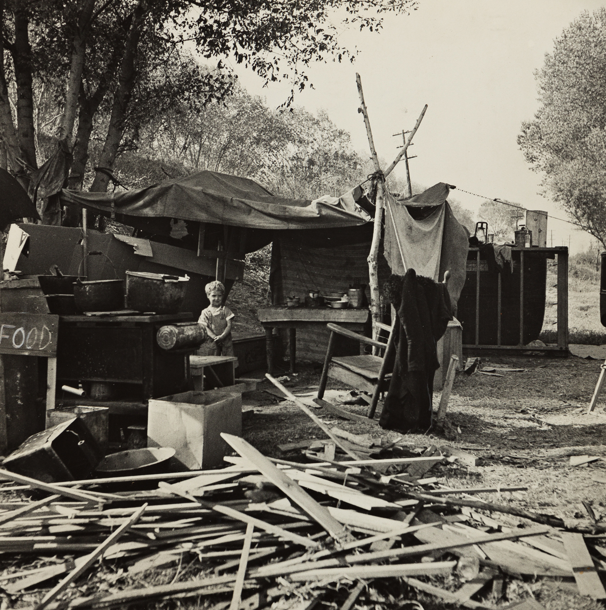 DOROTHEA LANGE (1895-1965) Destitute Family, American River Camp, Sacramento, California.